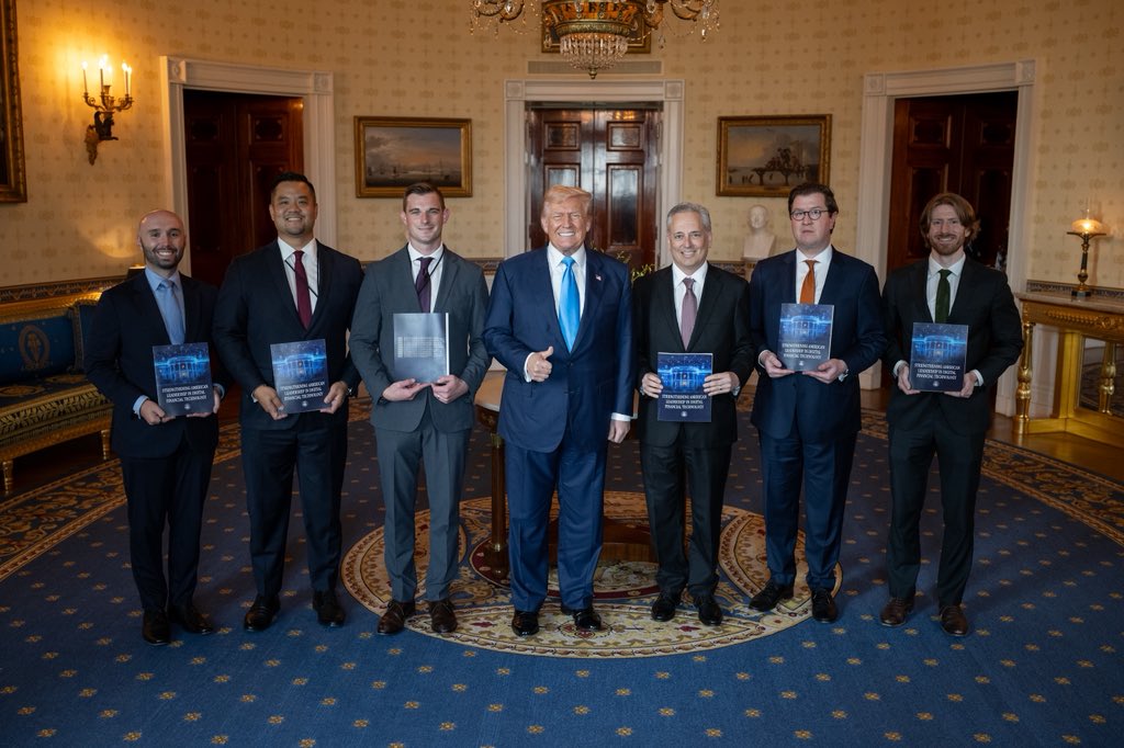 Bo Hines, pictured to the left of US President Donald Trump