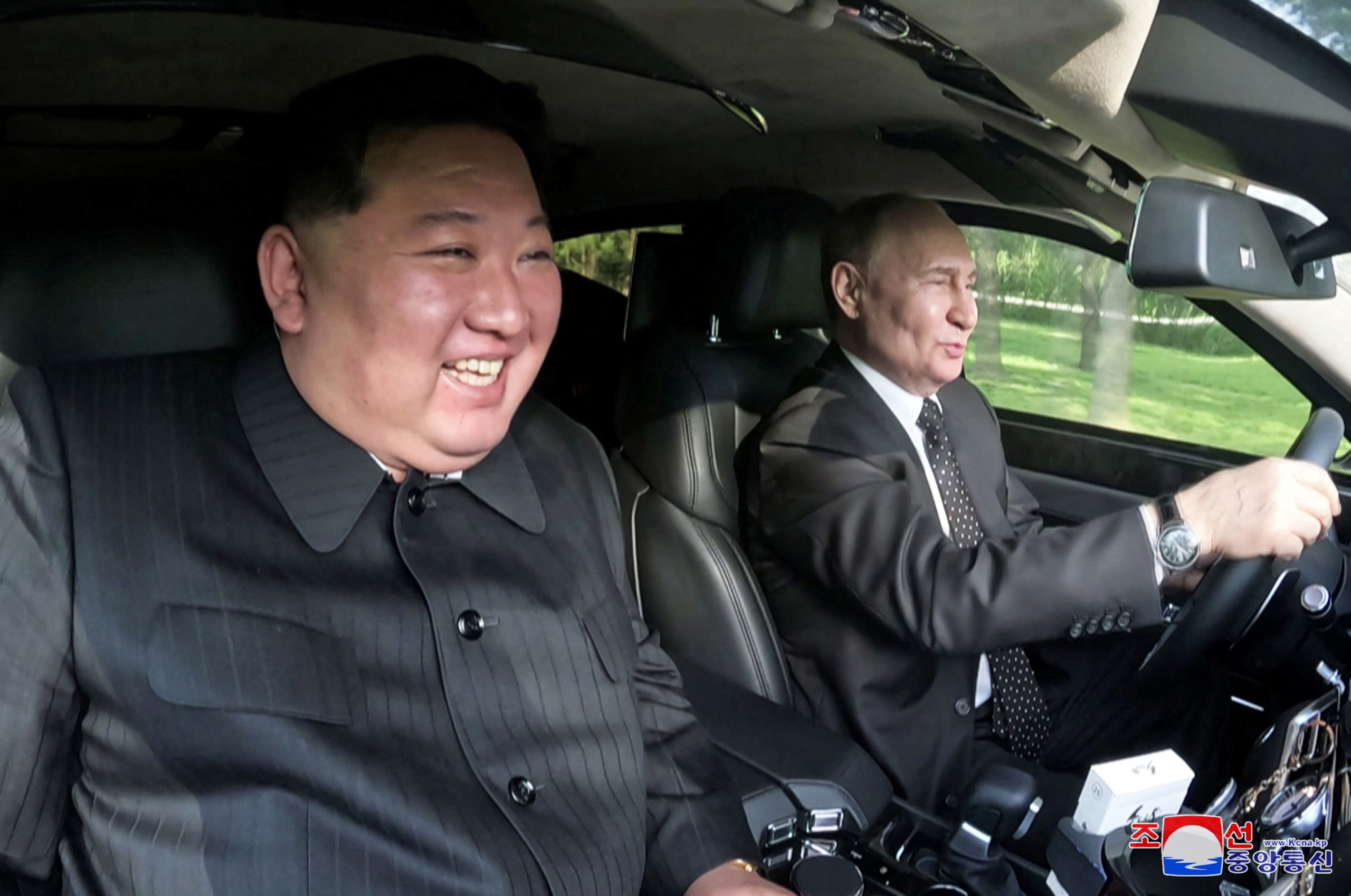 Presidents Kim Jong Un and Vladimir Putin