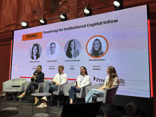 duncan-moir-center-left-speaking-in-paris